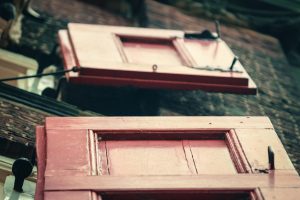 Red open window shutters Dordrecht